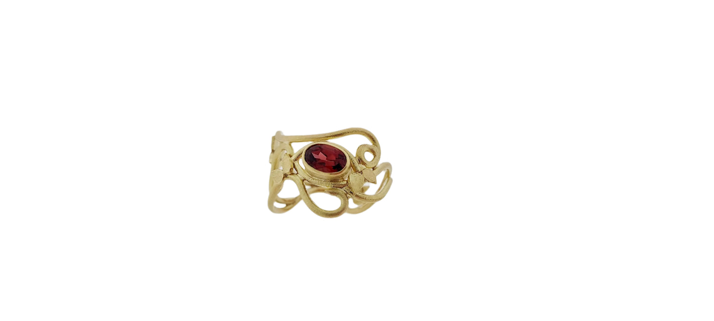 Gold Ring Au 750 with garnet and leaves